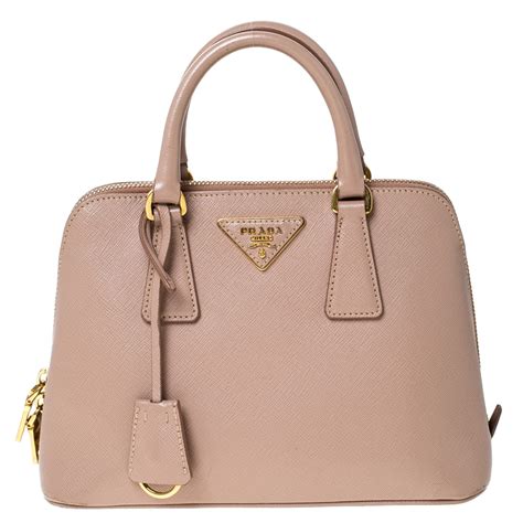 nude prada bag|Prada.